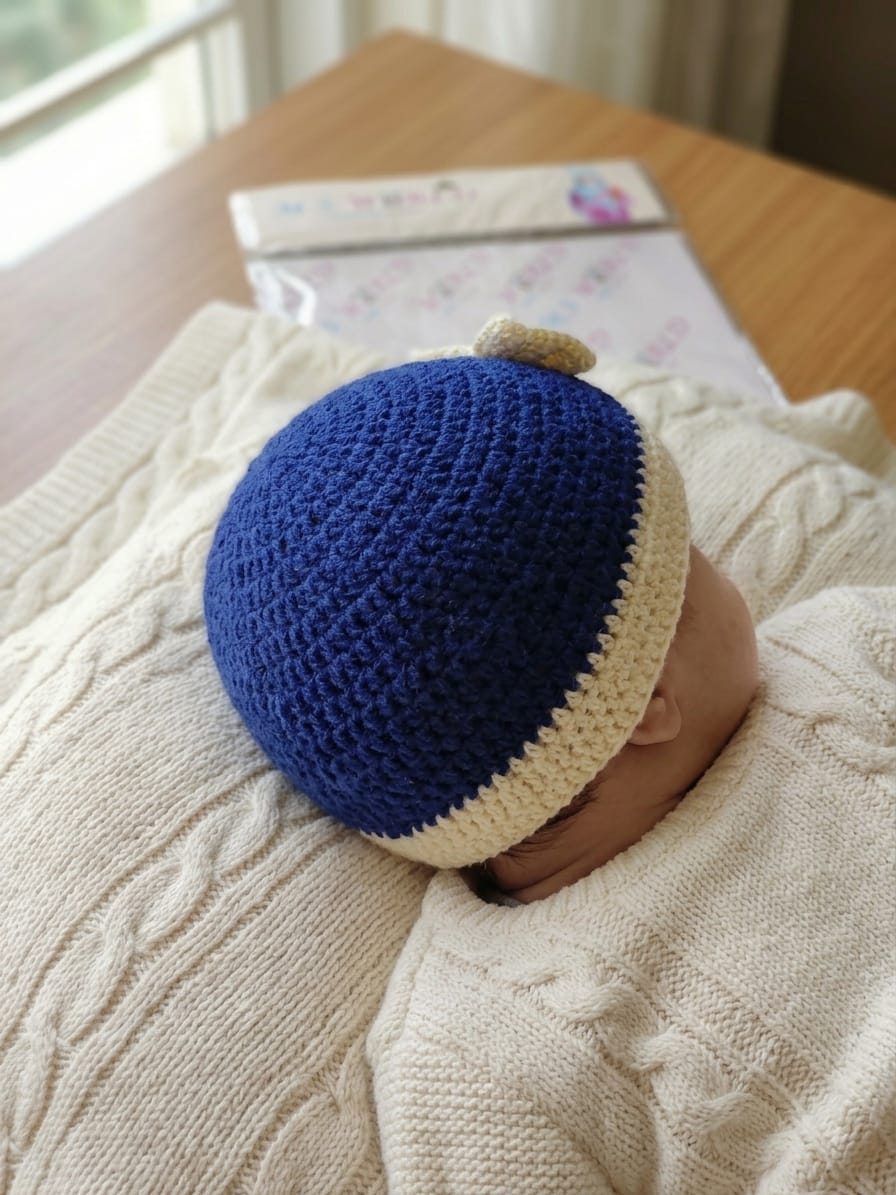 Handmade Woolen Baby Cap with Cute Bow | Soft & Warm Newborn Winter Beanie (Blue & Cream)