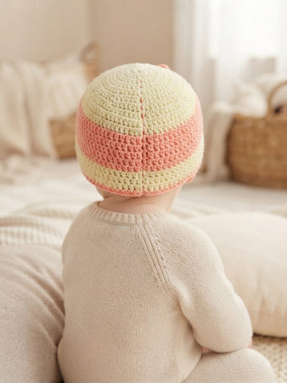 Handmade Striped Woolen Baby Cap with Cute Bow – Soft & Warm Winter Beanie for Newborns & Infants (Peach & Cream)